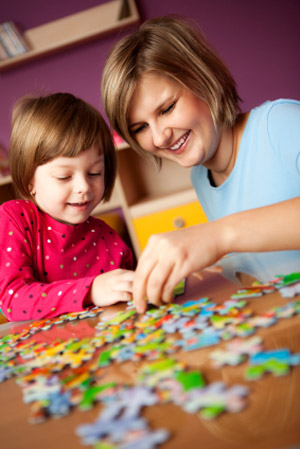 Mother and Child with Puzzle